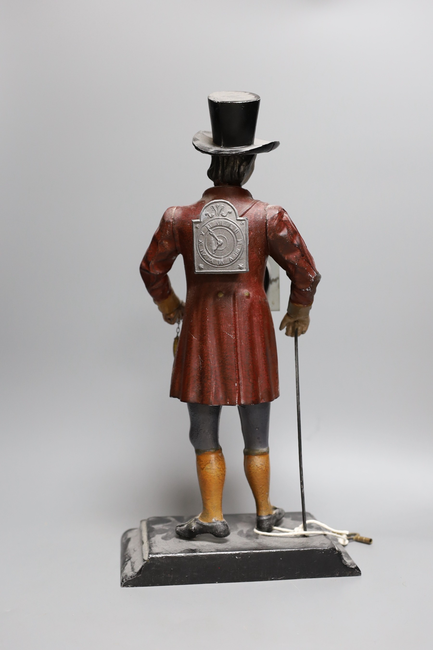 A late 19th century Dutch painted spelter figural timepiece, 40cm tall